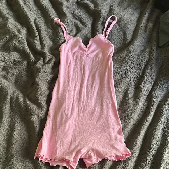 SKIMS LOGO POINTELLE ONESIE | BUBBLE
GUM - Picture 3 of 7